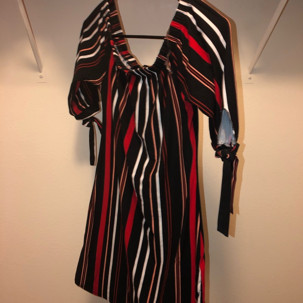 Beautiful Off the shoulder multi striped dress.